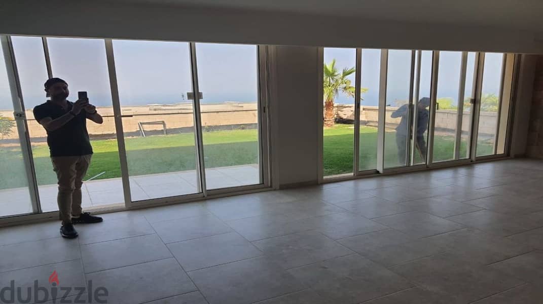 For sale, ground chalet with garden, 59 sqm, Sea View, in Ain Sokhna, delivery at the end of the year 2