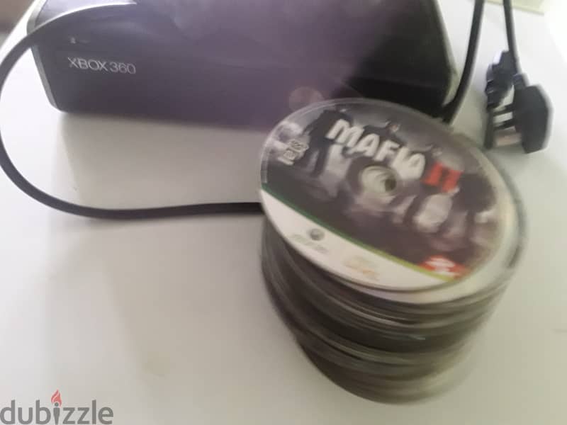 Xbox 360 متعدل عليه 20 لعبة و35 CD شغال اونلاين 2
