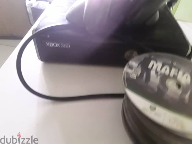 Xbox 360 متعدل عليه 20 لعبة و35 CD شغال اونلاين 3