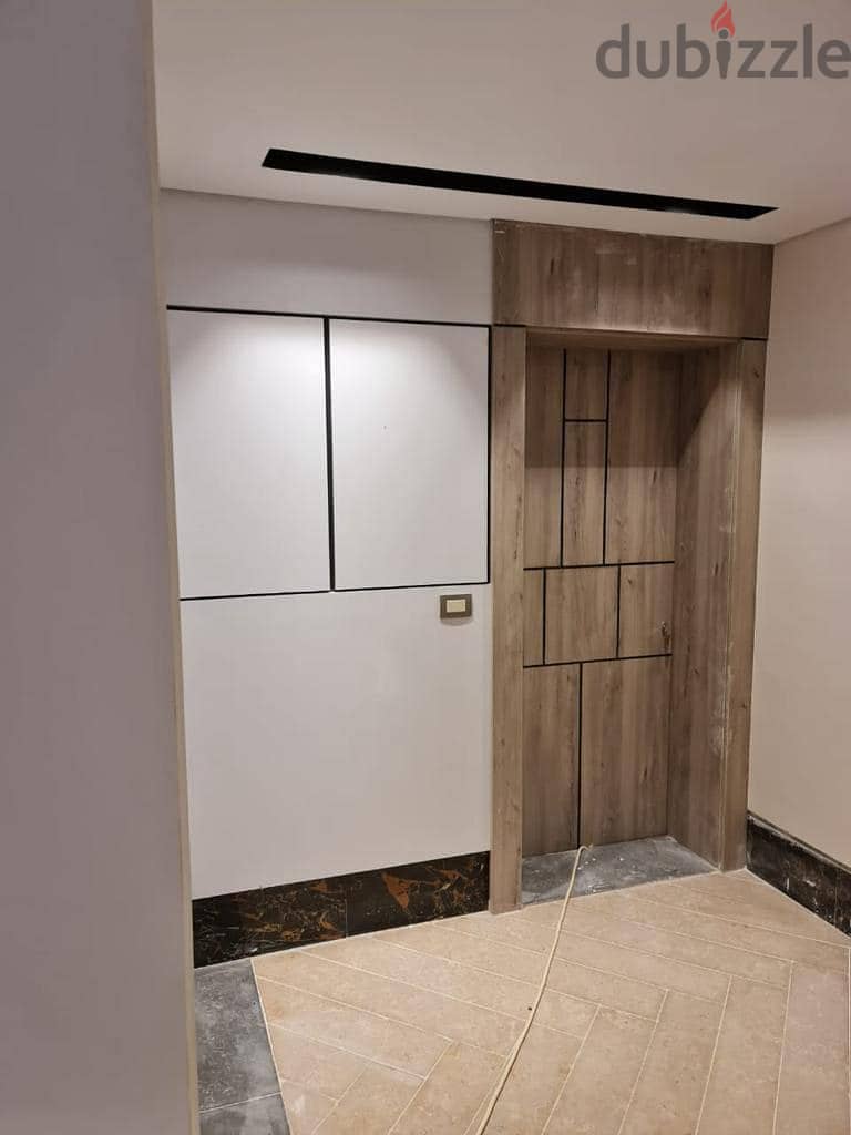 a fully finished apartment for sale in new cairo in golden square beside mountain view icity in | Palm Hills New Cairo | lagoon view in installments 2