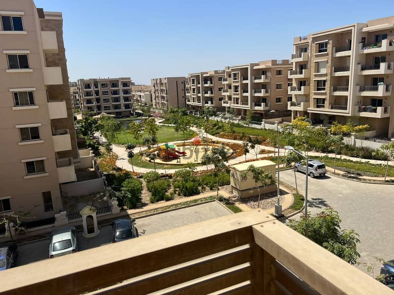 For sale, an apartment in the most distinguished compound next to Cairo International Airport, in the heart of the Fifth Settlement, Taj City Compound 4