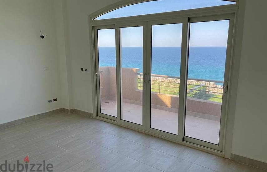 a fully finished lagoon view chalet for sale in | Telal El-Sokhna | before porto sokhna directly on the sea with a private garden with lagoon view 1