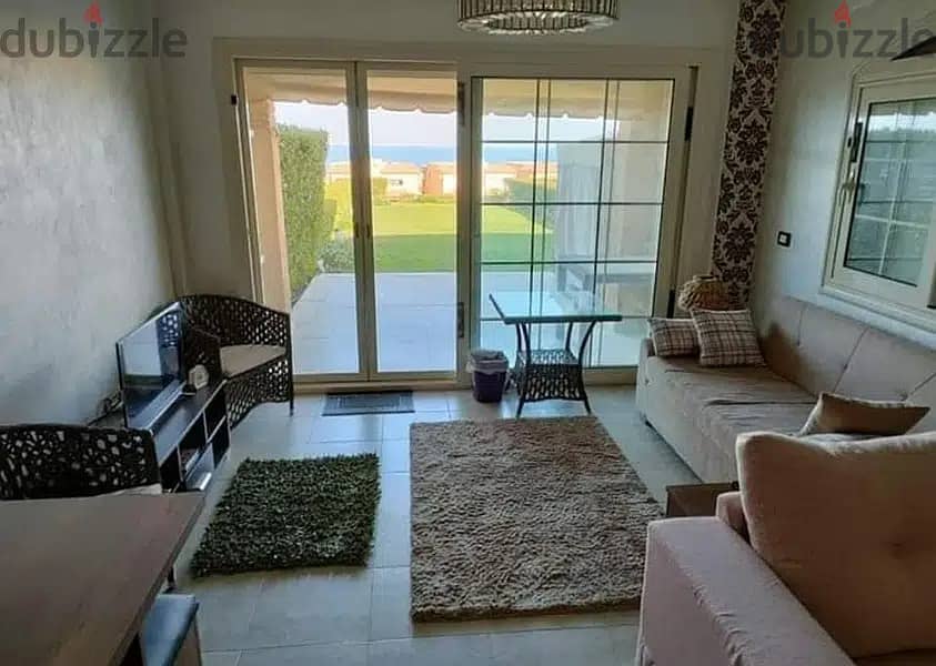 a fully finished lagoon view chalet for sale in | Telal El-Sokhna | before porto sokhna directly on the sea with a private garden with lagoon view 3
