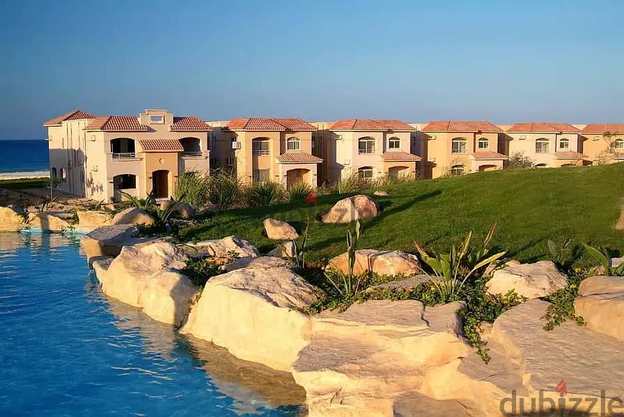 a fully finished lagoon view chalet for sale in | Telal El-Sokhna | before porto sokhna directly on the sea with a private garden with lagoon view 4