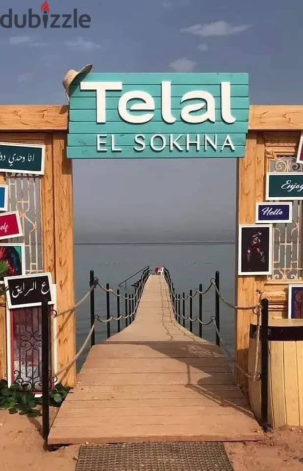 a fully finished lagoon view chalet for sale in | Telal El-Sokhna | before porto sokhna directly on the sea with a private garden with lagoon view 6