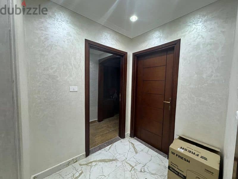 شقة للبيع في الحي الثامن الشيخ زايد متشطبة بالكامل 4