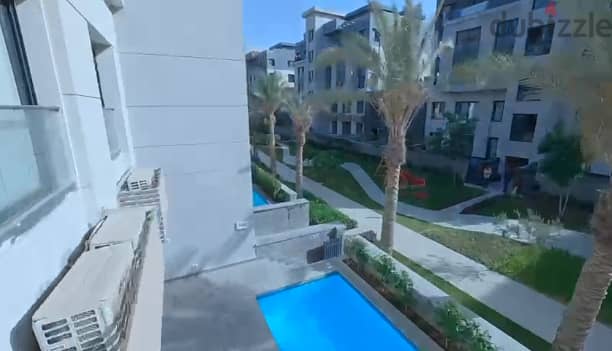 Apartment with garden for sale, smart home finishing, with a 10% down payment, in Trio Gardens, Fifth Settlement 9