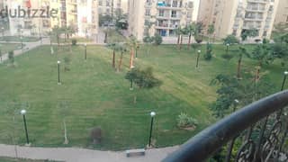 A 211 sqm apartment for rent, new law, in Al-Rehab 2 Wide Garden, in the tenth phase