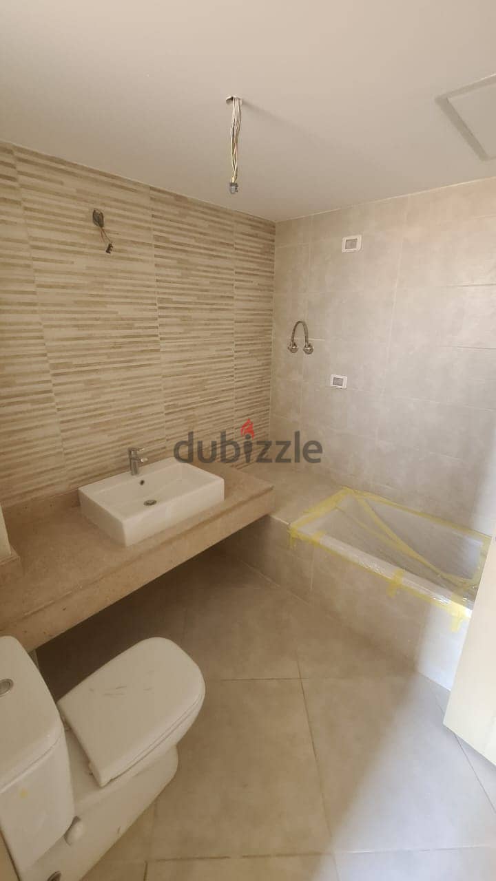 Apartment with garden for rent in New Giza Amberville 11