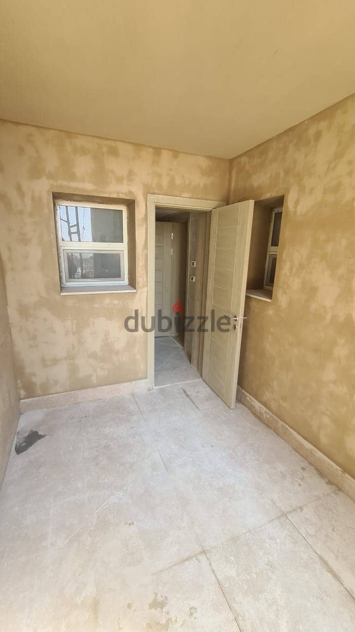 Apartment with garden for rent in New Giza Amberville 14