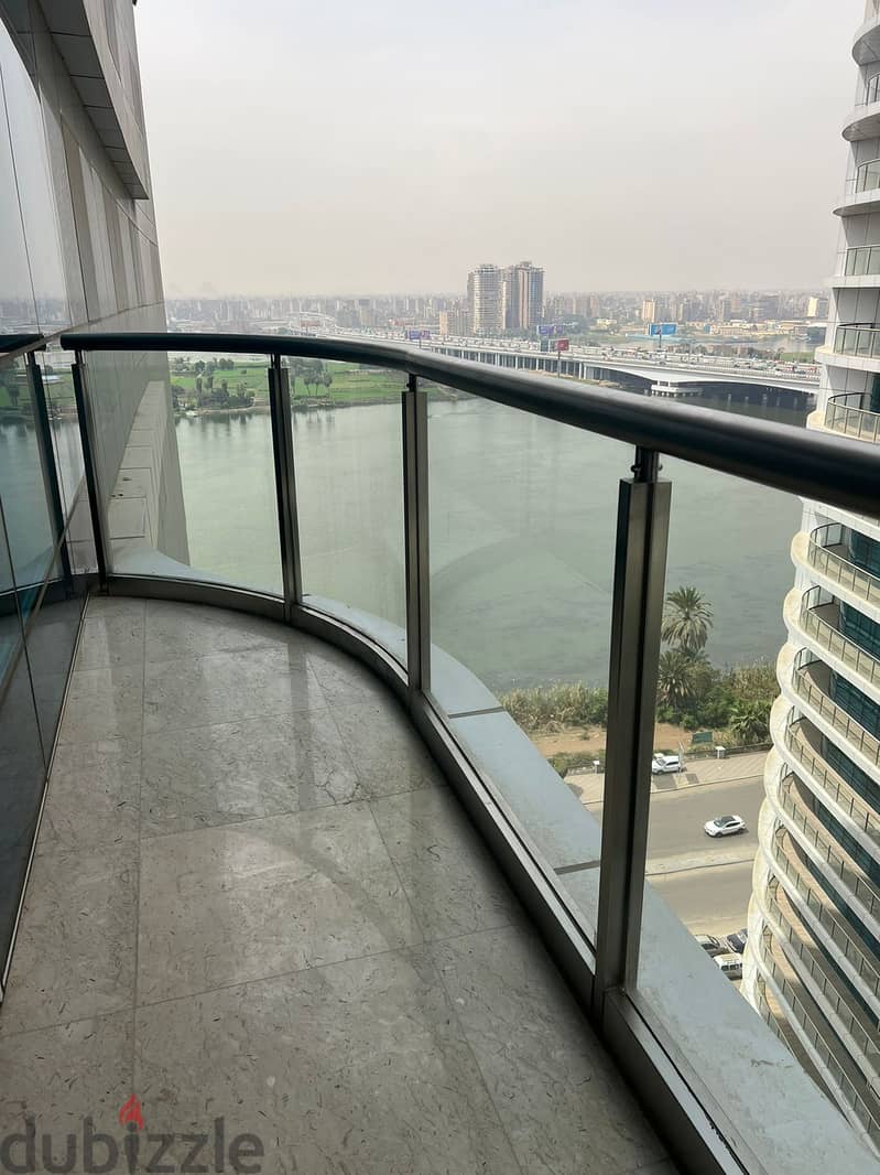 For sale an apartment in Nile Pearl Towers on the Nile on the 18th floor, immediate receipt next to Hilton Maadi, installments 1