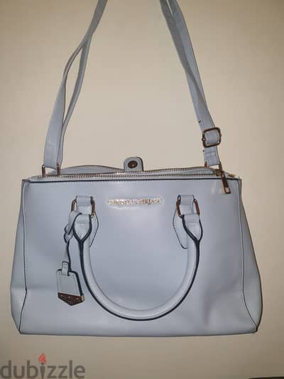 شنطة christian siriano handbag