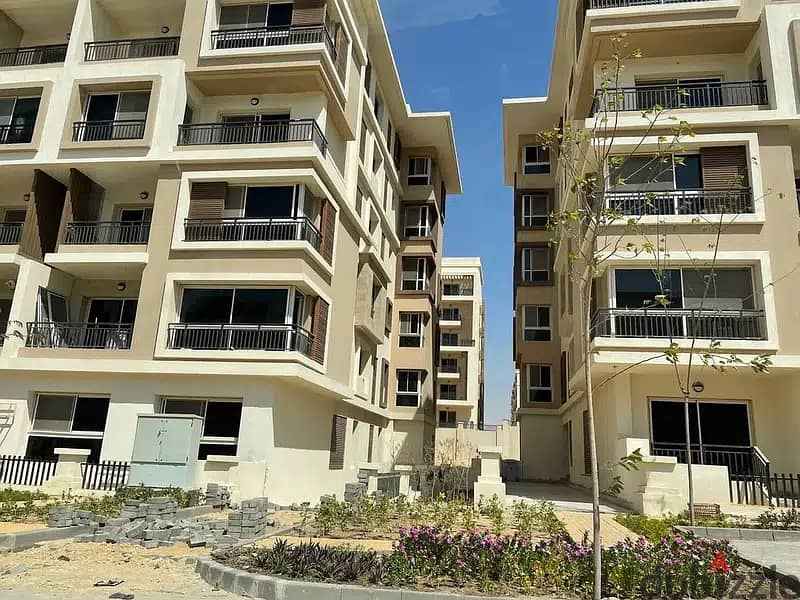 Apartment for sale, 111 meters, ground floor with garden, in Taj City phases 1