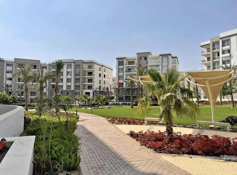 Resale Palm Hills new Cairo Cleo Phase less than developer price by 3 million Apartment with garden for sale installments over 2032 New Cairo 5