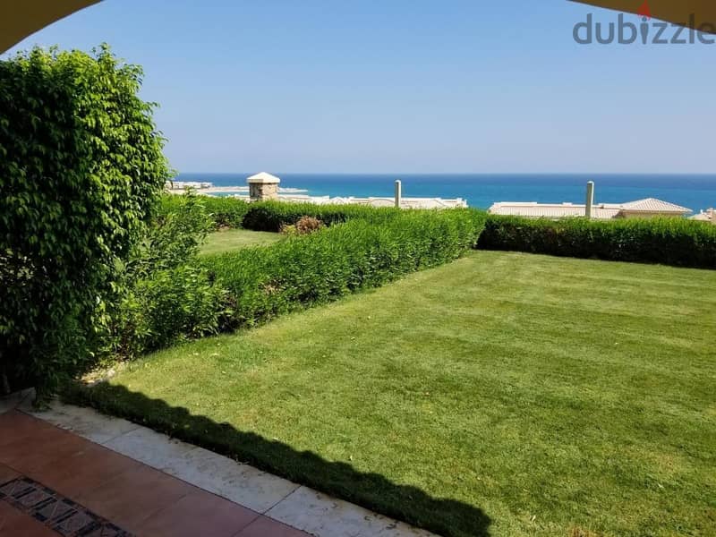 Ground chalet with a private garden and very high-end finishes directly on the sea in the most prestigious village in Ain Sokhna in La Vista Gardens 5