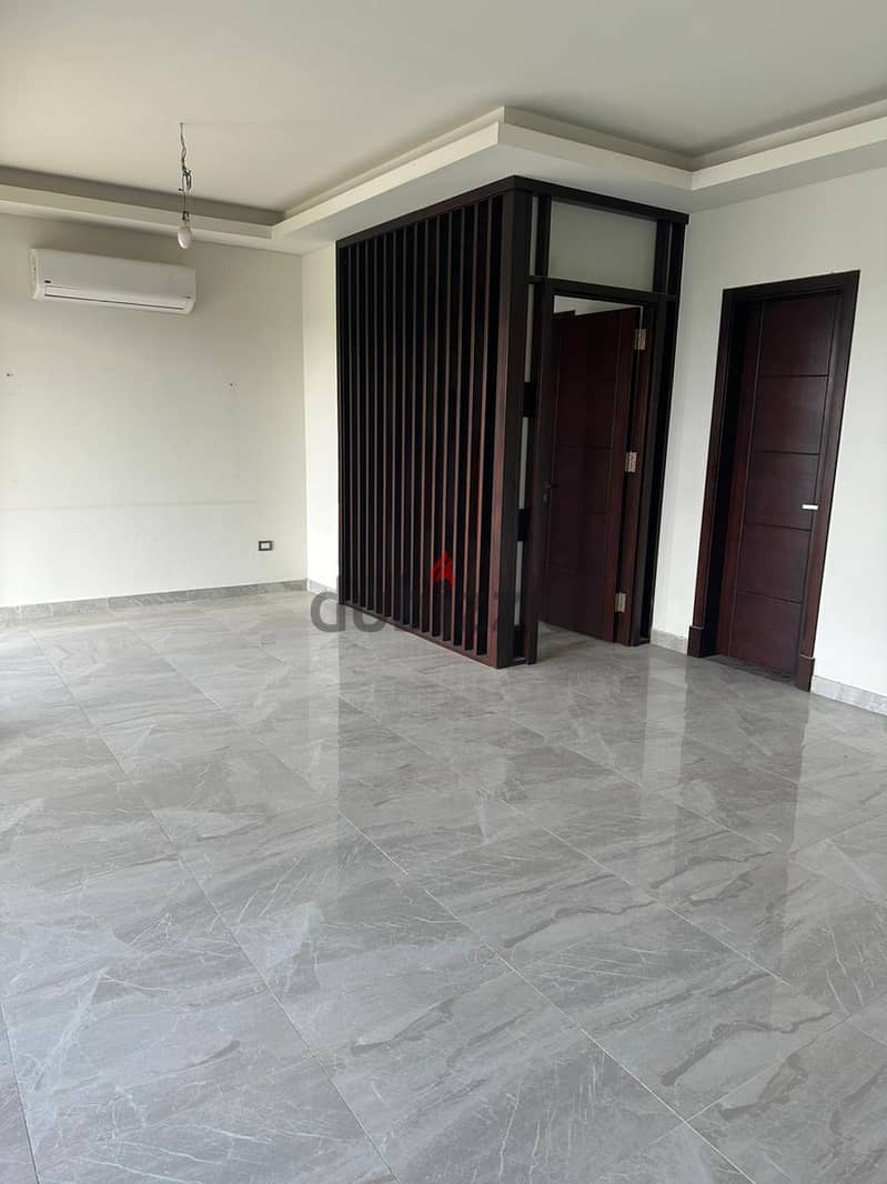 Semi furnished apartment 2 rooms rent in Village Gate Palm Hills New Cairo 0