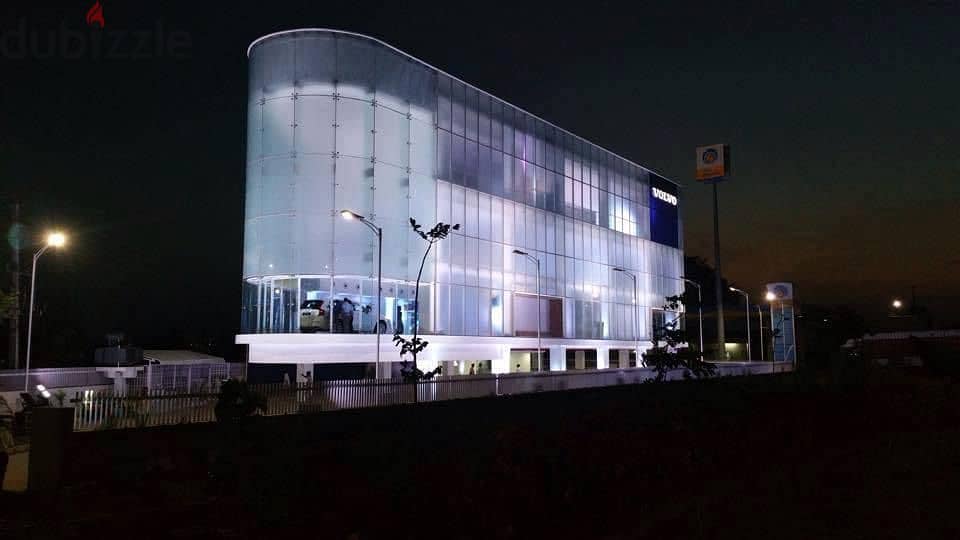 For sale a car showroom in Sheikh Zayed on the desert road in a strategic location in the strongest and largest commercial mall 6