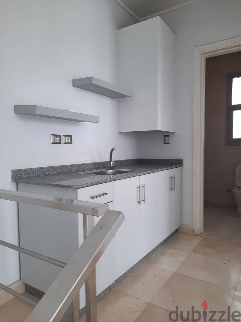 semi furnished Penthouse with appliances for rent in Village gate Palm Hills New Cairo 9