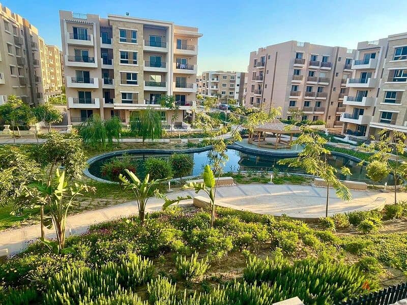 Two-bedroom apartment with a 37% discount for a limited time in a compound near Madinaty. 9