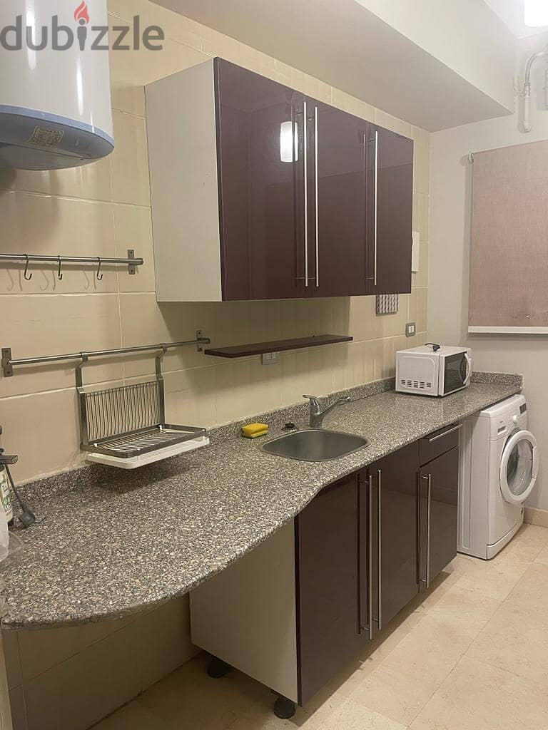 Fully-furnished studio for rent ultra super lux in prime location -The Village , 5th Settlement , New Cairo 18