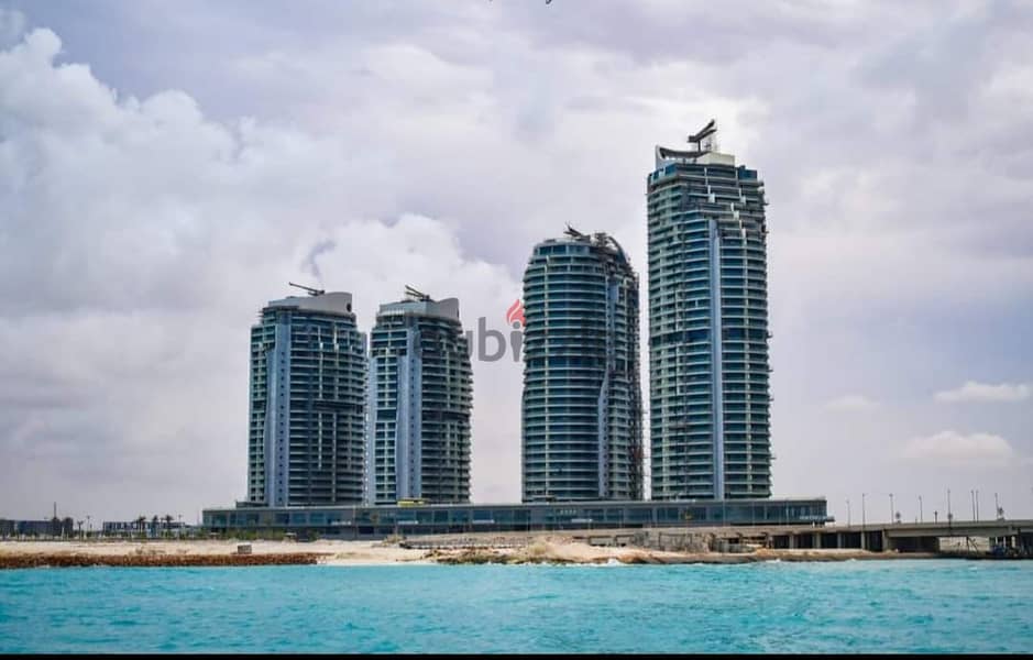 Distinctive apartment for sale in Al Alamein Towers, fully finished, with air conditioners, direct view on the sea, towers new alamain 3