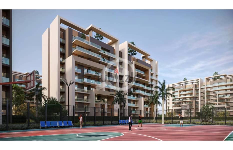 167 sqm apartment for sale in the Administrative Capital in City Oval Compound, discounts up to 28%, in installments over 10 years, with a minimum loa 2