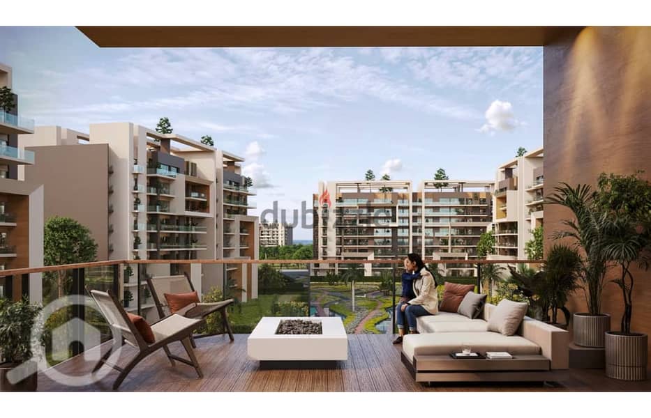 167 sqm apartment for sale in the Administrative Capital in City Oval Compound, discounts up to 28%, in installments over 10 years, with a minimum loa 16