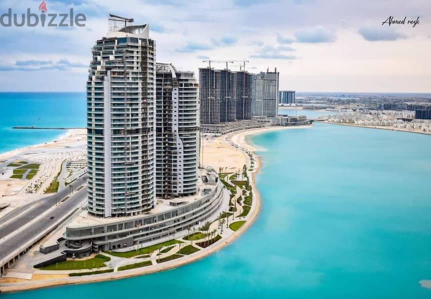 For sale, a super-luxe finishing hotel apartment, receipt nearby, charming view on El Alamein Towers on the North Coast, City Edge 4