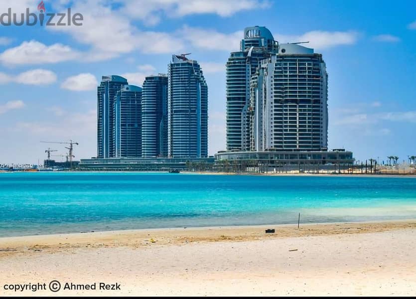For sale, a super-luxe finishing hotel apartment, receipt nearby, charming view on El Alamein Towers on the North Coast, City Edge 5