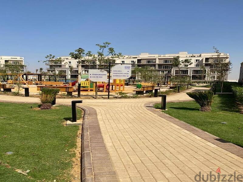 Resale apartment, prime location, semi-finished, in October Plaza Compound in 6th of October 9