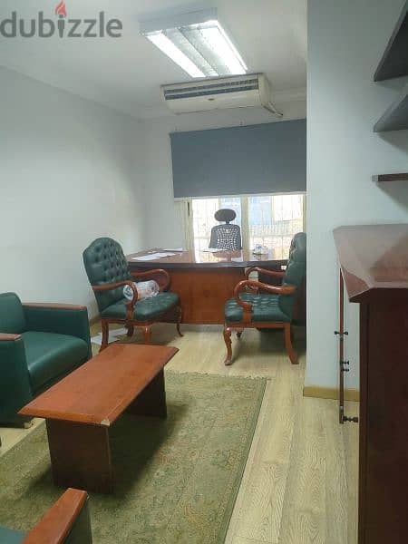 مكتب مفروش 300 م للايجار علي شارع رئيسي Nasr City 1
