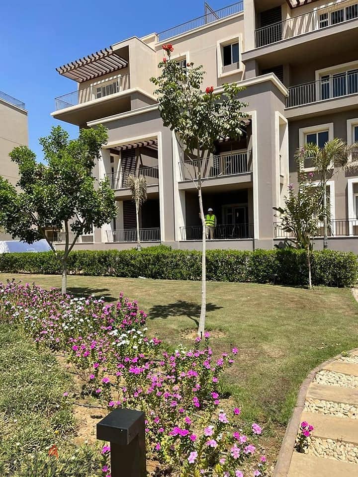 Resale apartment with private garden in October Plaza Compound in 6th of October 3