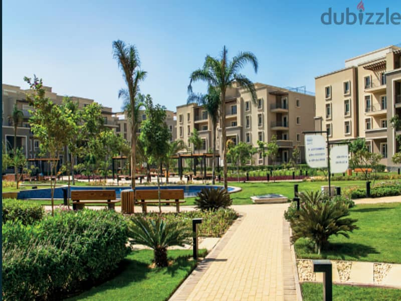 Resale apartment with private garden in October Plaza Compound in 6th of October 6