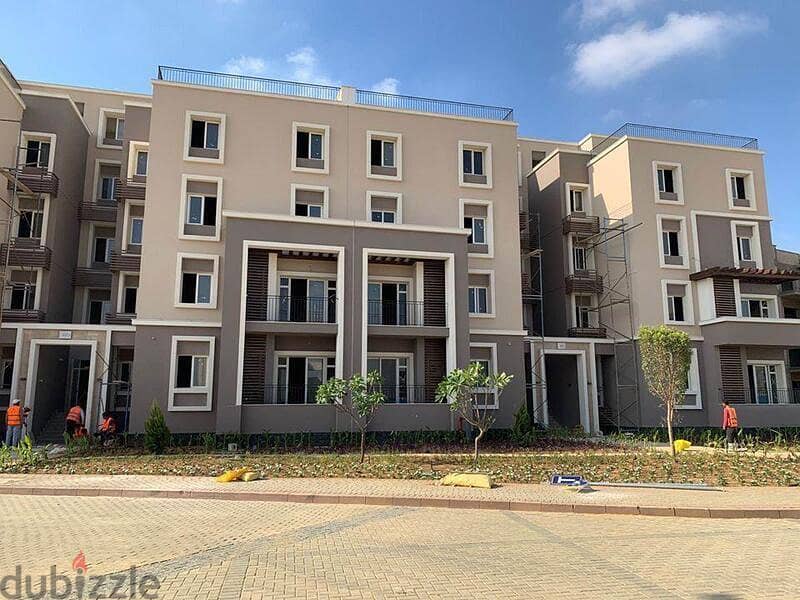 Resale apartment with private garden in October Plaza Compound in 6th of October 10