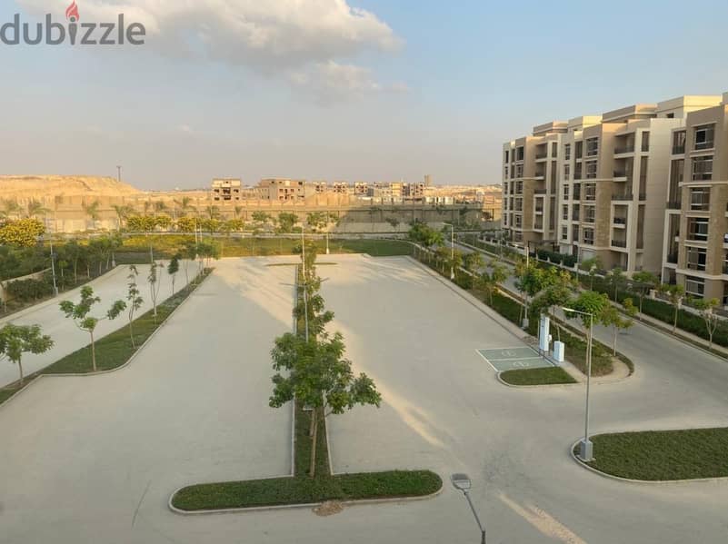 128 sqm apartment for sale, 39% discount for a limited time, directly on Suez Road in New Cairo, Taj City Compound 5