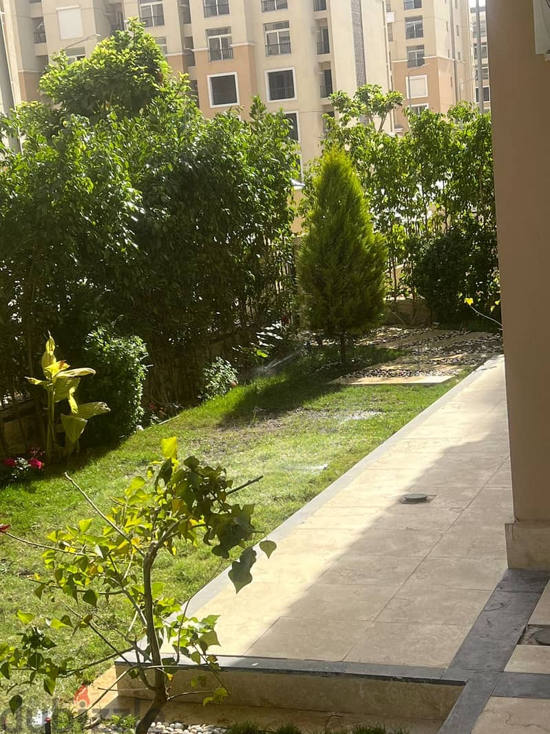apartment for rent 164 m garden prime location view Landscape Fully furnished Kitchen with appliances+air conditioners in compound sarai 2