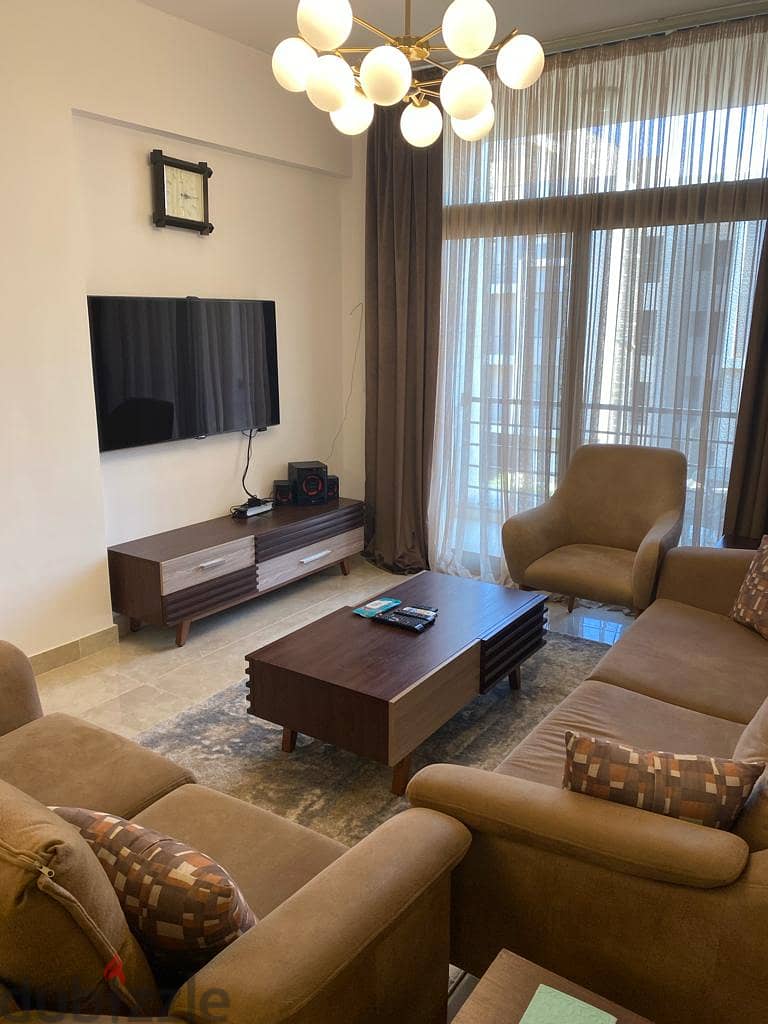 apartment for sale 124 m prime location Super luxe finishing Fully furnished Kitchen with appliances air in compound al marasem 2