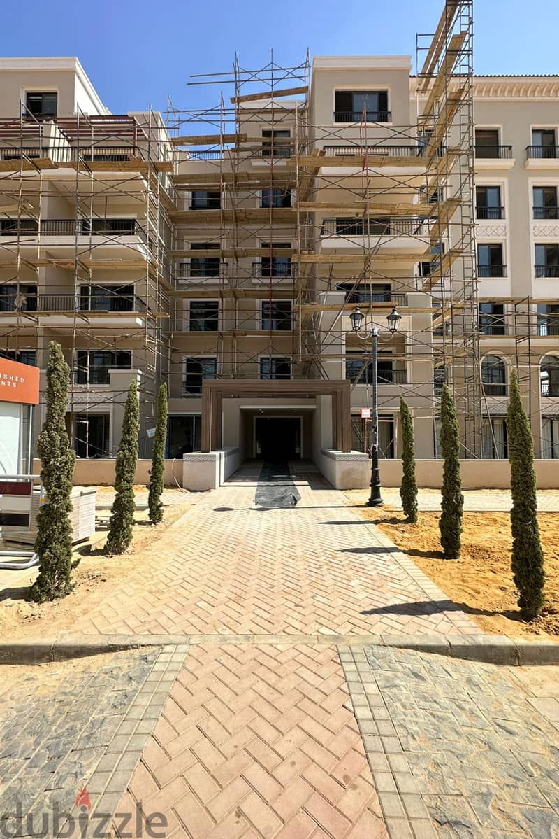 95m Garden Apartment Written Off with Adaptations (Resale Below Company Price) in Village west in Heart of Zayed 1