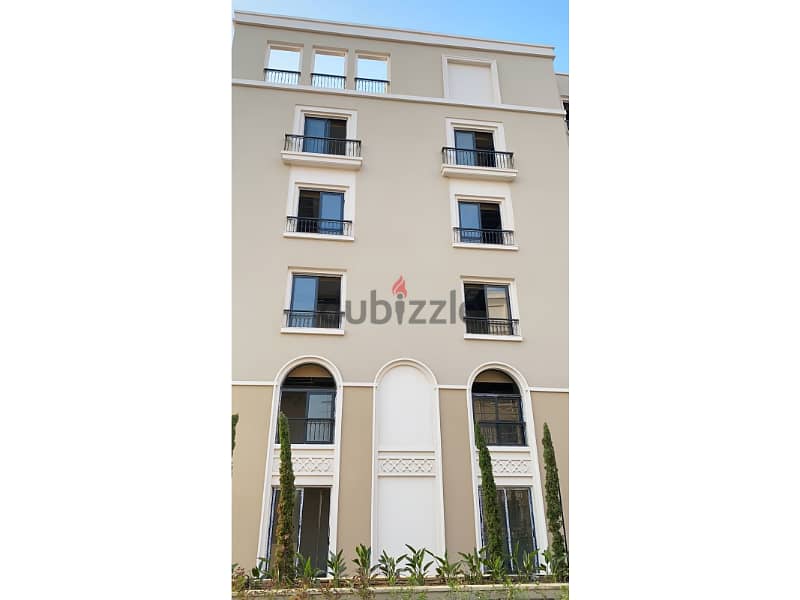95m Garden Apartment Written Off with Adaptations (Resale Below Company Price) in Village west in Heart of Zayed 2