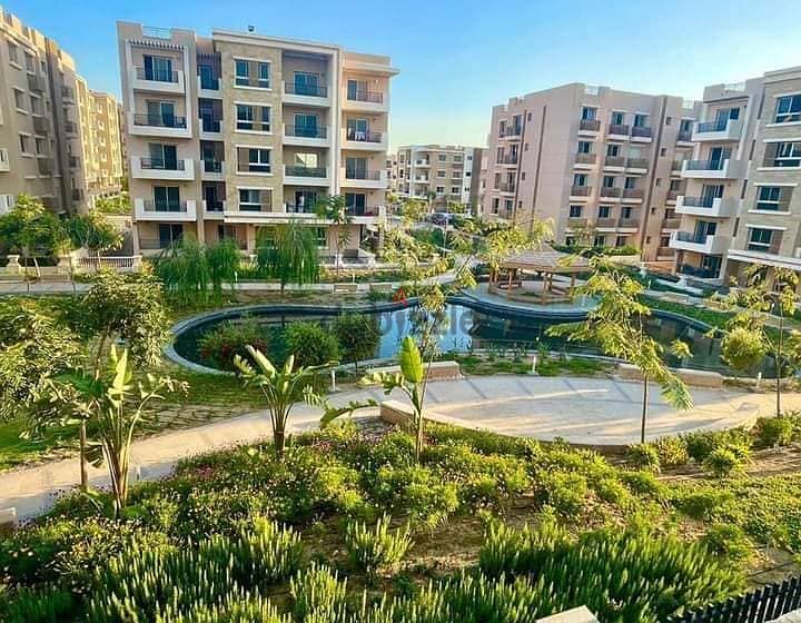Apartment with garden for sale 142m 3 rooms Sarai New Cairo next to Madinaty 10% down payment and 120% discount on the increase of the down payment 22