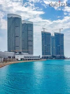 Apartment for sale in installments in a very special location, immediate receipt, sea view, fully finished, in New Alamein Towers