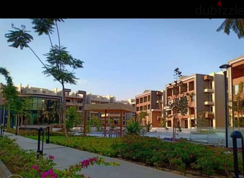 ميدتاون القاهرة الجديدة شقة للبيع الطابق الأرضي مباني 185م حديقة 50 م 2
