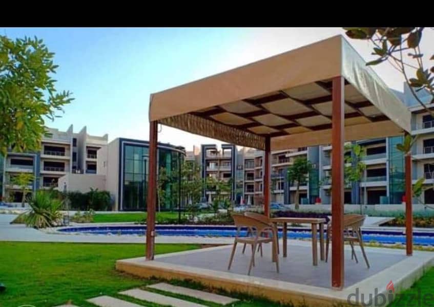 ميدتاون القاهرة الجديدة شقة للبيع الطابق الأرضي مباني 185م حديقة 50 م 4