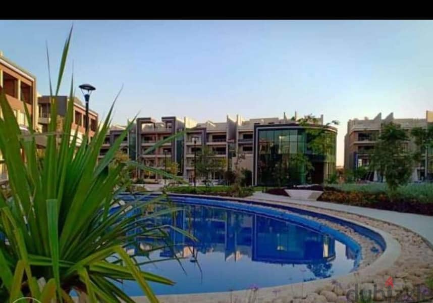 ميدتاون القاهرة الجديدة شقة للبيع الطابق الأرضي مباني 185م حديقة 50 م 5