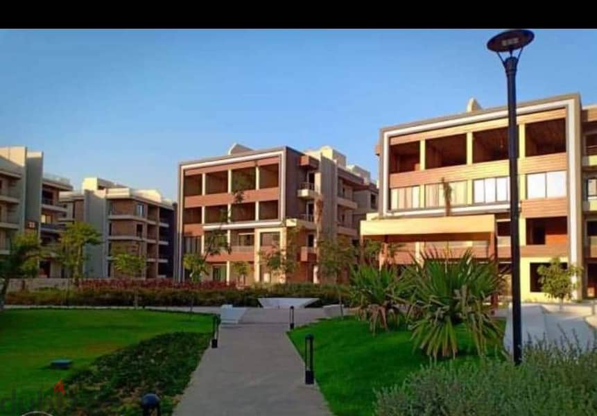 ميدتاون القاهرة الجديدة شقة للبيع الطابق الأرضي مباني 185م حديقة 50 م 6