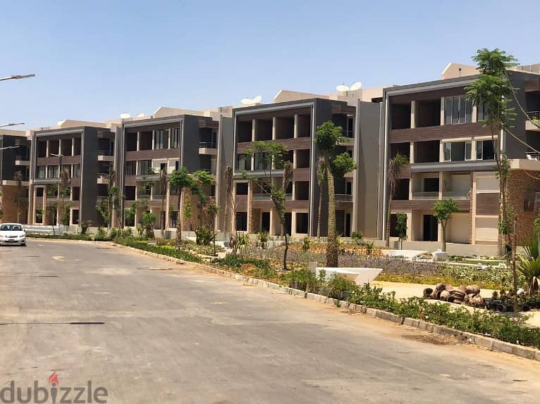 ميدتاون القاهرة الجديدة شقة للبيع الطابق الأرضي مباني 185م حديقة 50 م 8