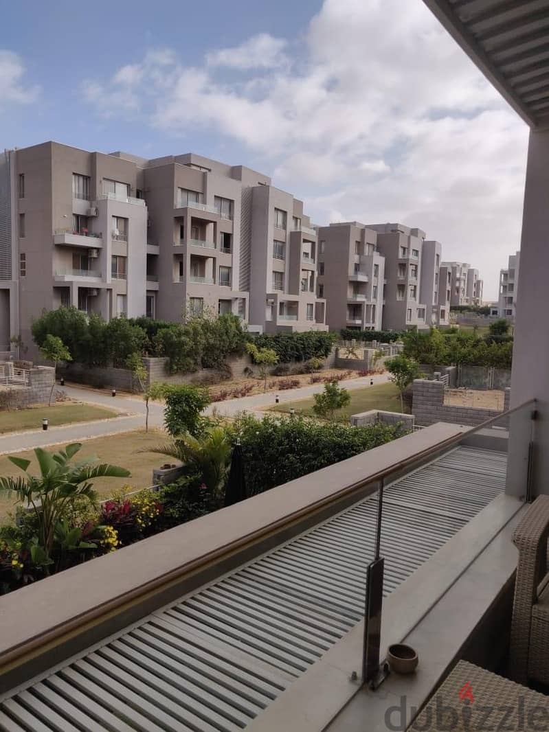 Resale apartment for sale in Palm Hills Village Gardens Katameya Palm Hills VGK at less than the company price 1
