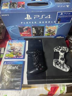 PS4 500GB+ 2 Controllers + Minecraft + The Last Of Us + Other Games