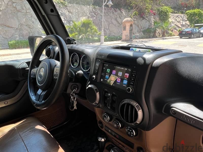 jeep wrangler 2014 ( excellent condition ) 7