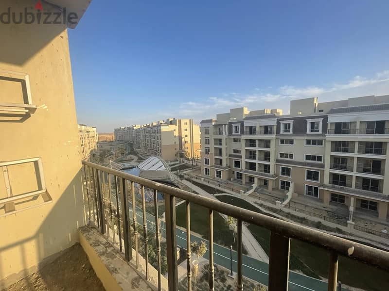 Apartment 166 m for sale in installments over the longest payment period in the settlement in front of the international airport, Taj City Compound 4